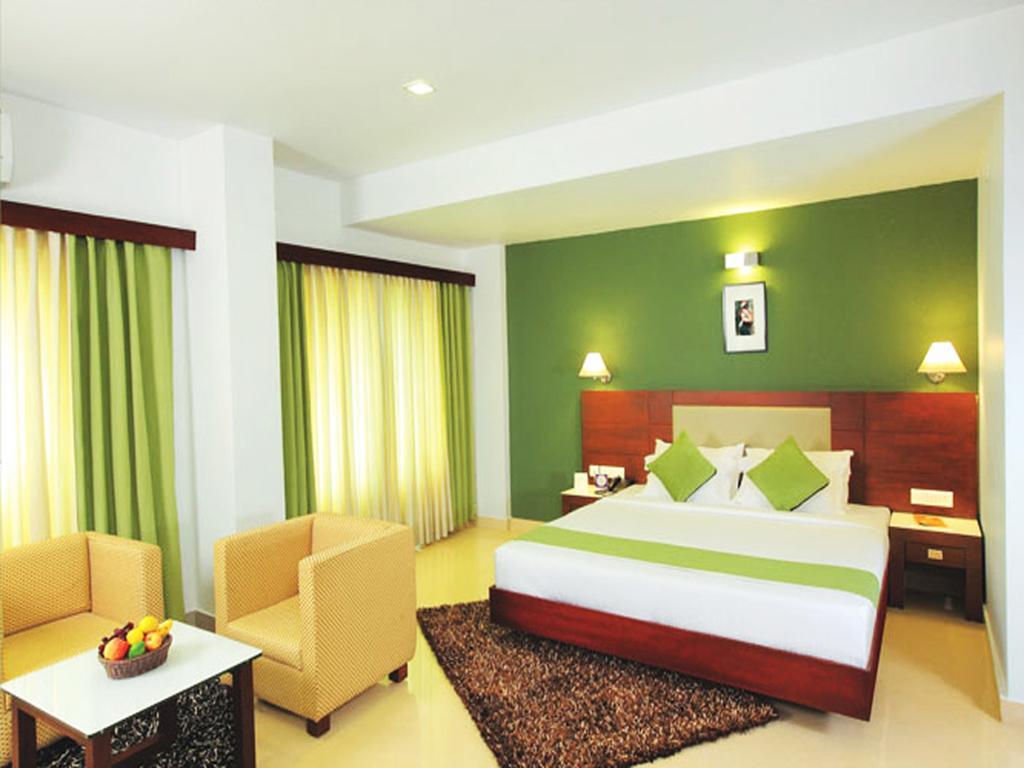 Hotel Hills Park Pathanāmthitta Oda fotoğraf